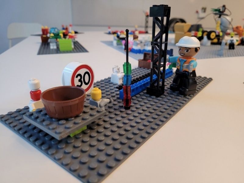 A detailed LEGO model representing a business concept built during a Spark Shift workshop